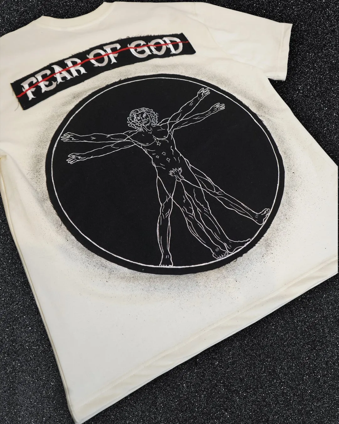 FEAR OF GOD vs VITRUVIAN MAN BLACK VALKYRE TSHIRT