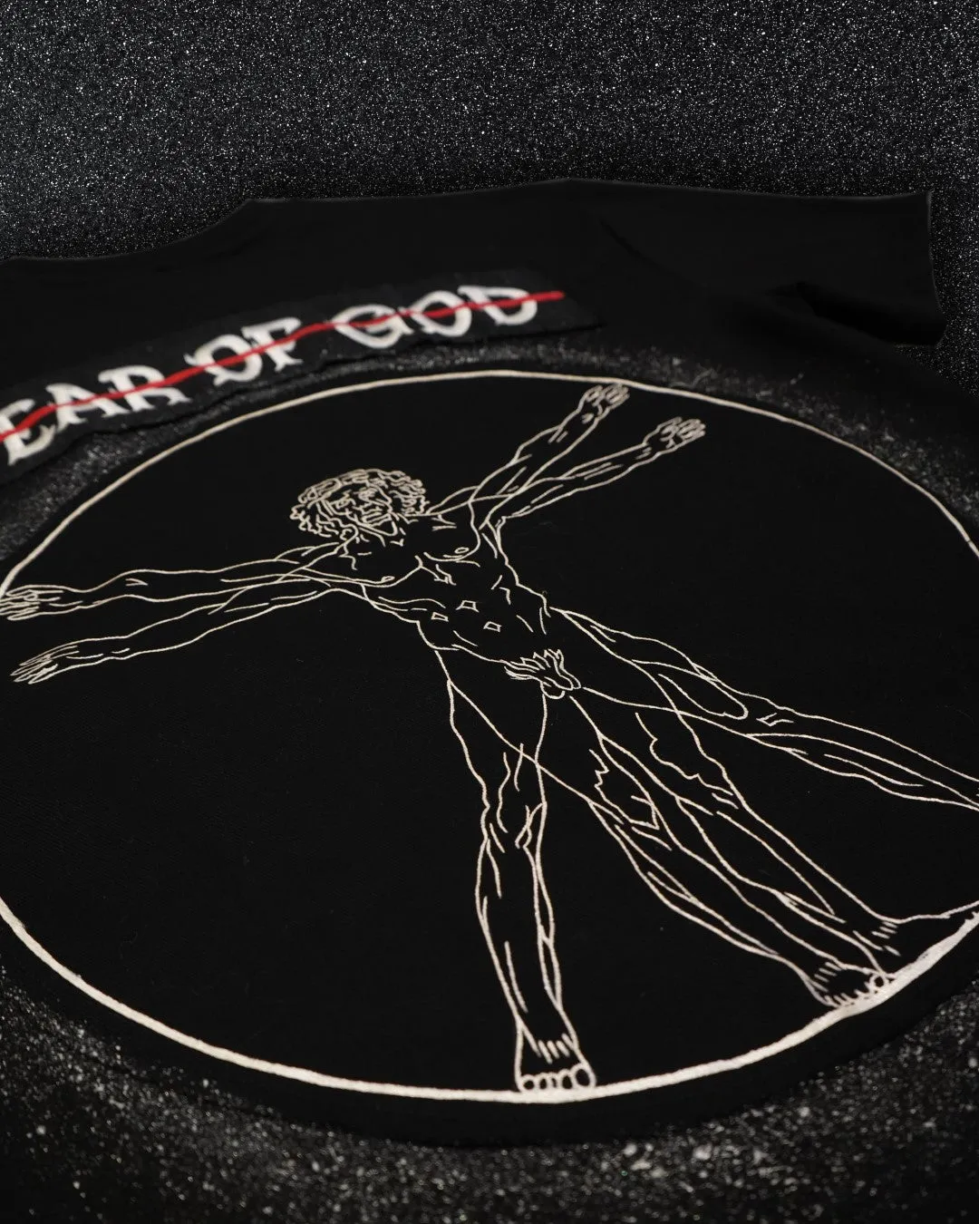 FEAR OF GOD vs VITRUVIAN MAN BLACK VALKYRE TSHIRT